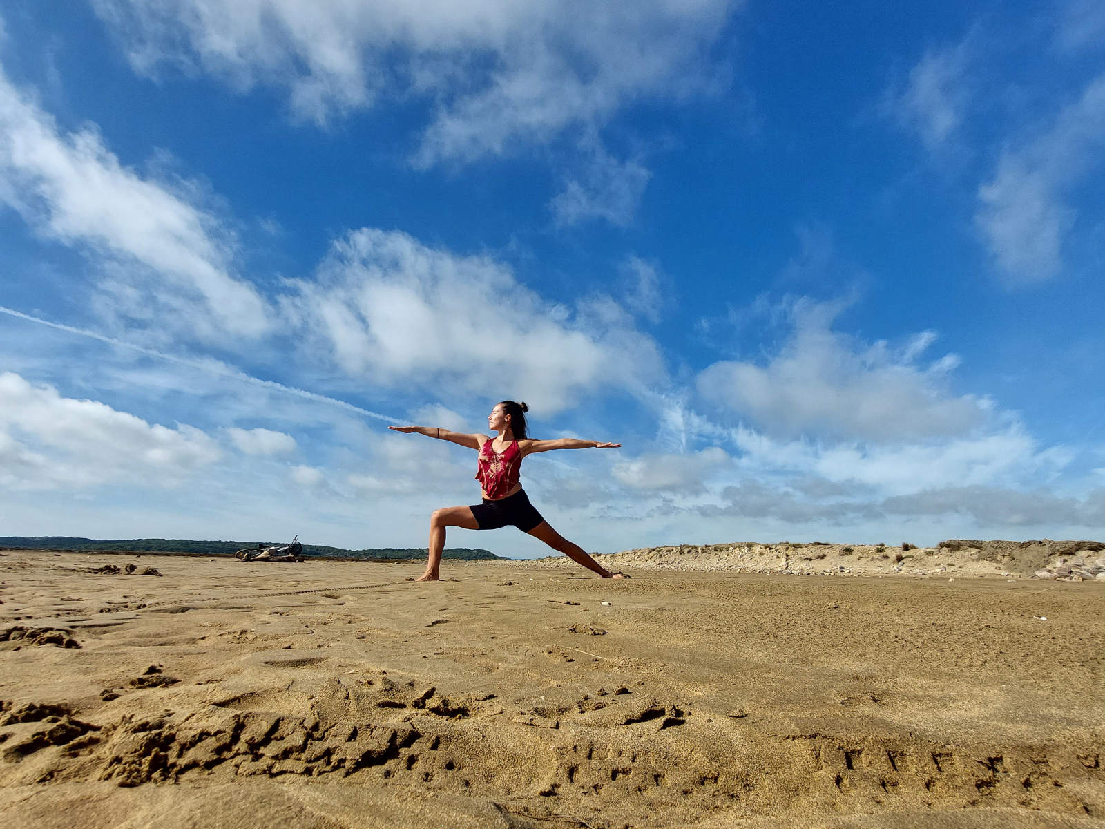 Yogaposition på stranden